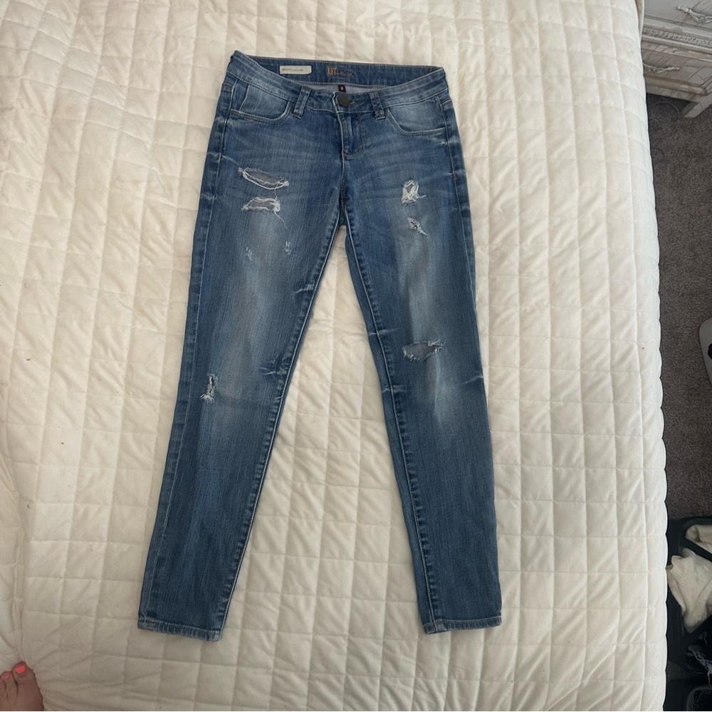 Distressed Blue Denim Jeans